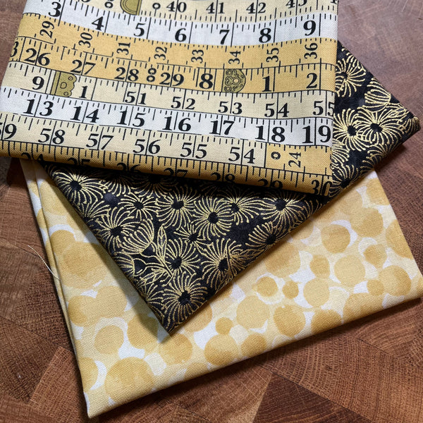 FABRIC TRIO: 3 x Fat Eighths: 'Tape Measures' Yellow + 'Flowering Gum' Black + Bumbleberries BB304