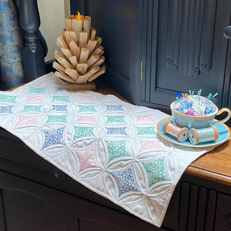 SAMPLE SALE: 26AG: Cathedral Window Table Centre (White with Lewis & Irene Bunny Hop) Approx 12" x 23"