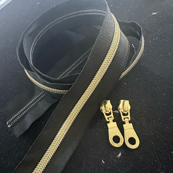1 METRE of Zipper Tape + 2 Zip Pulls: Black with Gold (circle cutouts)