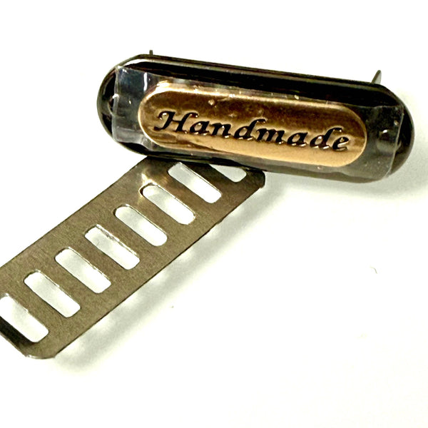 HARDWARE ACCESSORY: One "Handmade" Metal Brad Plaques in gold colour