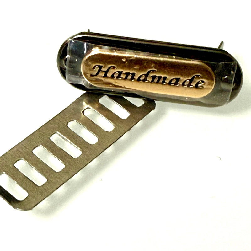 HARDWARE ACCESSORY: One "Handmade" Metal Brad Plaques in gold colour