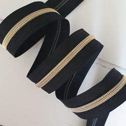 Zipper Tape BY THE METRE: Black with Gold Coil Teeth